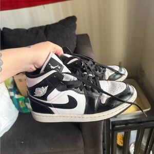 Jordan Black and White Mid-Top Sneakers